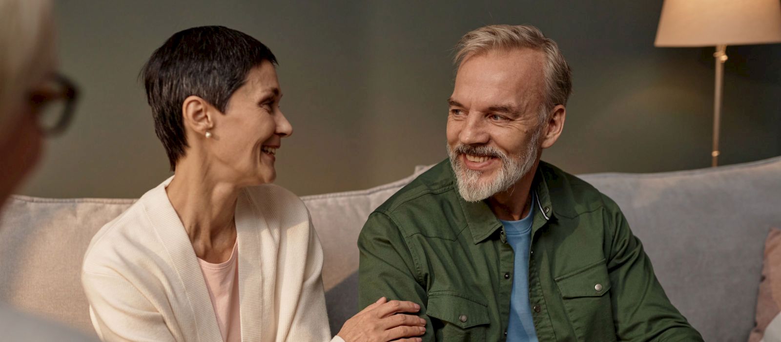 smiling mature couple talking together representing in person couples counselling in duncan bc